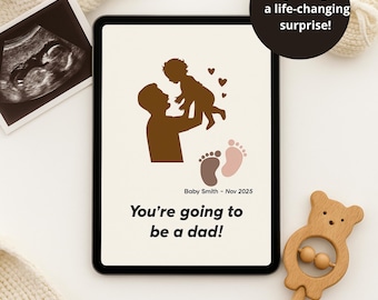 May include: A digital tablet displays a brown silhouette of a father holding a child, with hearts and footprints. Text reads "You're going to be a dad!" and "Baby Smith - Nov 2025." A wooden bear rattle and ultrasound image are also visible.