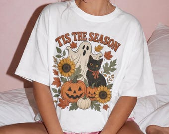 Herbst-Shirt mit Vintage-Motiv: Geist, schwarze Katze, Sonnenblumen und Kürbis – ein echter Hingucker! Retro-Halloween-Shirt in bequemen Farben für Damen – das perfekte Geschenk für den Herbst.
