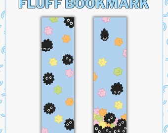 May include: Two blue bookmarks with the text "FLUFF BOOKMARK". Each bookmark features a pattern of black, fluffy creatures and colorful star-shaped designs in pink, yellow, and orange.