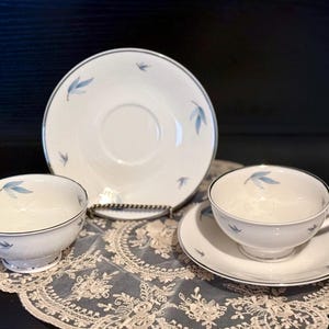 Vintage Syracuse China, Celeste, Cups and Saucers, 2 Cups and 7 Saucers, White,Blue and Gold Trim