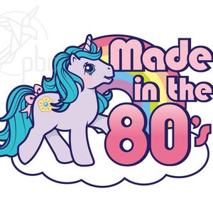 May include: A cartoon illustration of a lavender unicorn with teal hair and a pink bow, standing on a cloud. A rainbow arches behind the unicorn, with the text "Made in the 80's" in pink.
