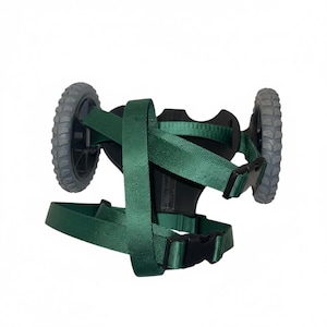 May include: A mobility device featuring a black frame with two grey treaded wheels on either side. The device includes adjustable dark green nylon straps and black plastic buckles, designed to support movement with a structured harness system.
