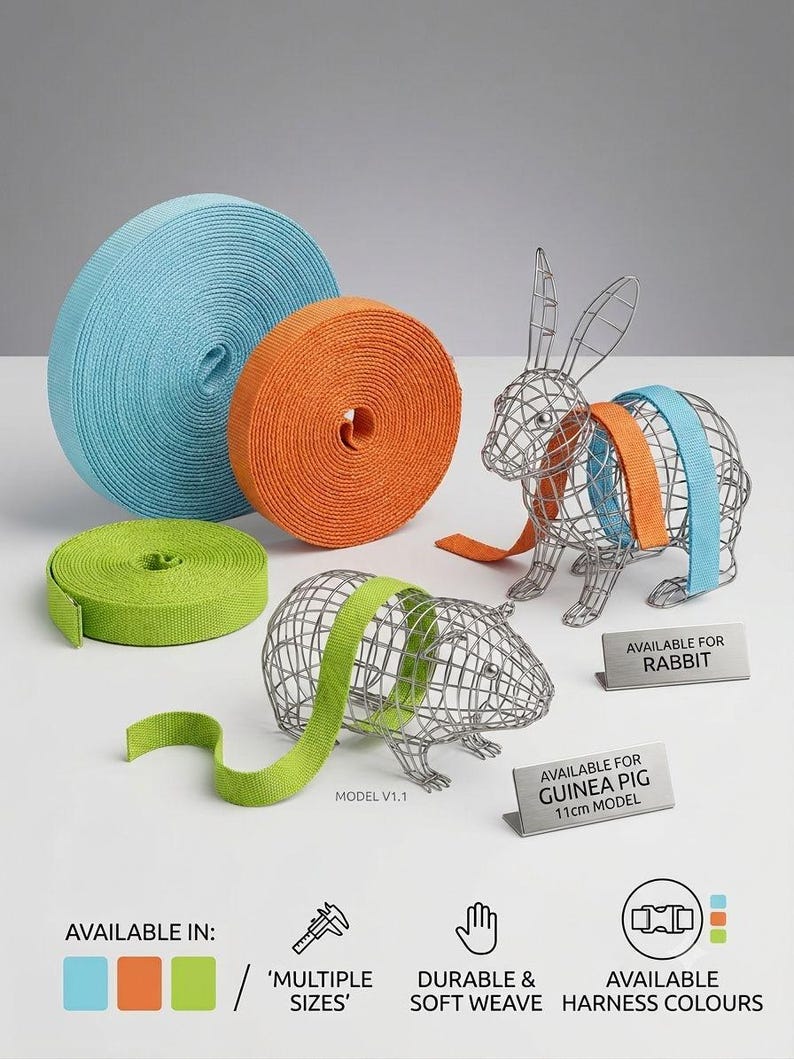May include: Three rolls of light blue, orange, and lime green webbing straps next to wire rabbit and guinea pig models. Text includes AVAILABLE FOR RABBIT, AVAILABLE FOR GUINEA PIG 11cm MODEL, AVAILABLE IN: MULTIPLE SIZES, DURABLE & SOFT WEAVE, AVAILABLE HARNESS COLOURS.