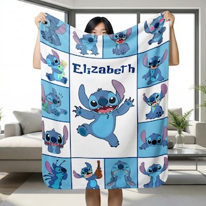 May include: A light blue and white blanket featuring multiple images of the character Stitch from the movie Lilo & Stitch. The name "Elizabeth" is printed in the center of the blanket.