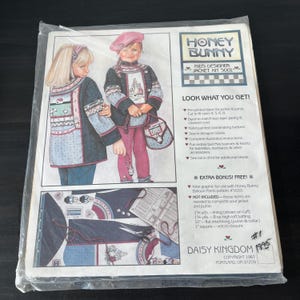May include: A sewing kit for making a child's jacket and purse. The kit includes pre-printed fabric, buttons, and instructions. The kit is called "Honey Bunny Kid's Designer Jacket Kit 5001".