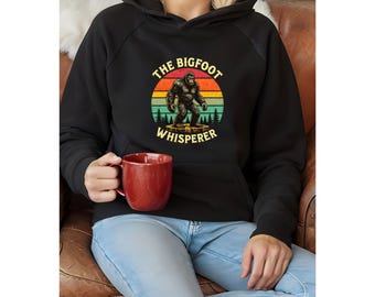 The Bigfoot Whisperer Hoodie, Funny Sasquatch Sweatshirt, Retro Bigfoot Pullover, Cryptid Lover Gift, Outdoors Camping Hoodie