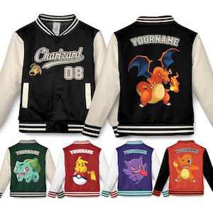 May include: Black and cream varsity jacket with "Charizard 08" text and a cartoon dragon graphic. Additional jackets in green, red, purple, and orange feature different character designs and the text "YOURNAME" on the back.