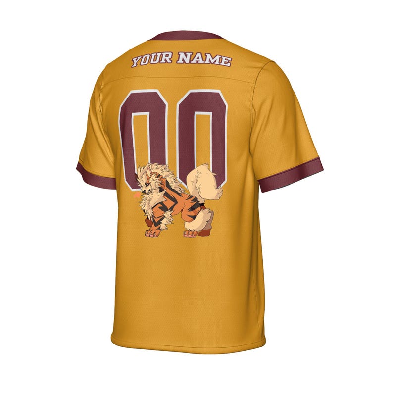 May include: Mustard yellow jersey with maroon accents and the text "YOUR NAME" across the shoulders. The jersey features the number "00" in maroon and a cartoon illustration of a fiery dog.