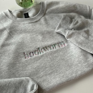 Bookworm Embroidered Sweatshirt: Minimalist Floral Crewneck, Cozy Reader Gift