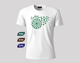 Puede incluir: Camiseta blanca con un diseño de diente de león verde con acentos de trébol y la palabra "lucky". El diseño incluye un tallo y un grupo de tréboles. La camiseta también tiene etiquetas PNG, SVG y EPS.