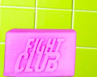 May include: A pink bar of soap with the words "FIGHT CLUB" embossed on the front.
