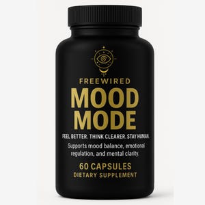 May include: A black supplement bottle with a black cap. The bottle has gold text that reads "FREEWIRED MOOD MODE" and "60 CAPSULES DIETARY SUPPLEMENT". The bottle also states "FEEL BETTER. THINK CLEARER. STAY HUMAN."
