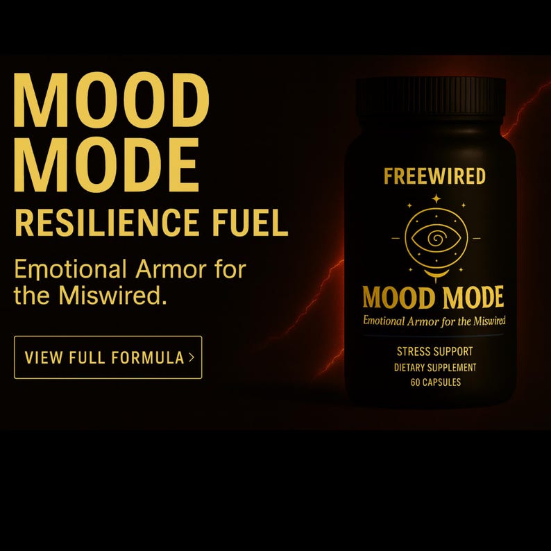 May include: A black supplement bottle with gold text reading "FREEWIRED" and "MOOD MODE." The label also states "Emotional Armor for the Miswired," "Stress Support," and "Dietary Supplement." The background is dark with gold text.