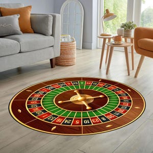 May include: A round casino-themed rug featuring a roulette wheel design. The rug has a dark brown wooden border with red and black numbered sections, green sections, and a gold-colored central spinner.