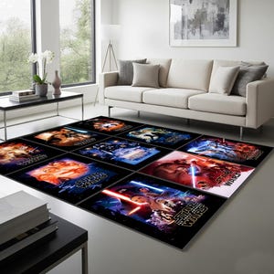 May include: A large rectangular rug featuring multiple Star Wars film posters. The rug has a black background with colourful images from the films. The rug is placed in a living room setting with a white sofa and a coffee table.