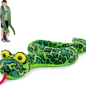 May include: A long, plush snake toy featuring a bright green body with dark green and black leopard-like spots. The snake has large, round yellow eyes with black pupils and a red felt tongue protruding from its mouth.