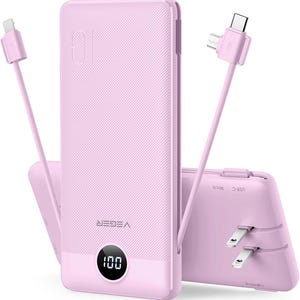 May include: A light pink portable power bank with a textured surface, a digital display showing 100, and the brand name VEGER. It features integrated charging cables with Lightning, USB-C, and Micro-USB connectors, plus a built-in AC wall plug.