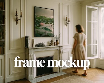 May include: A framed picture of a tranquil scene with pink lotus flowers and green lily pads. The artwork is above a marble fireplace. The text "frame mockup" is displayed in white across the bottom of the image.