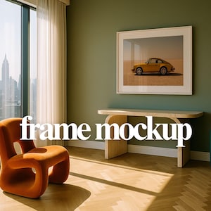 May include: Interior scene with an orange chair, a wooden table, and a framed picture of a yellow car. A tall window with a city view and a teal vase complete the room. The text "frame mockup" is displayed.
