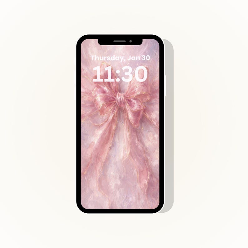 May include: A smartphone shows a pink bow wallpaper with the text "Thursday, Jan 30" and "11:30" in white. The phone has a black bezel and a white background.