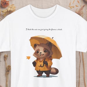 Rain and tanuki T-shirt, cute raccoon dog shirt, animal graphic tee, rainy day, umbrella, perfect gift Shirt, kids book style art tee,
