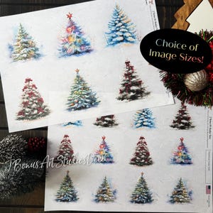 May include: Two sheets of Christmas tree decals with various designs. The trees are decorated with snow, lights, and bows. The text "Choice of Image Sizes!" is visible. The overall color palette includes white, green, red, and gold.