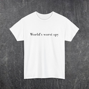 面白い世界最悪のスパイユニセックスTシャツ、ユーモラスなコットンTシャツ、スパイノベルティシャツ、シークレットエージェントギフト、スパイコスチュームトップ