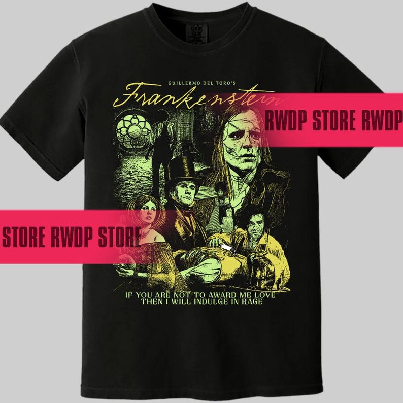 May include: Black t-shirt featuring a graphic from Guillermo del Toro's Frankenstein. The design includes illustrations of characters and the film's title. The text "IF YOU ARE NOT TO AWARD ME LOVE THEN I WILL INDULGE IN RAGE" is also included.