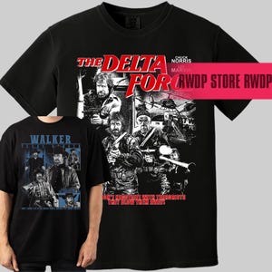 May include: Black t-shirts featuring action movie graphics. One shirt displays "The Delta Force" with Chuck Norris, and the other showcases "Walker, Texas Ranger." Both shirts have text and images related to the respective TV shows.
