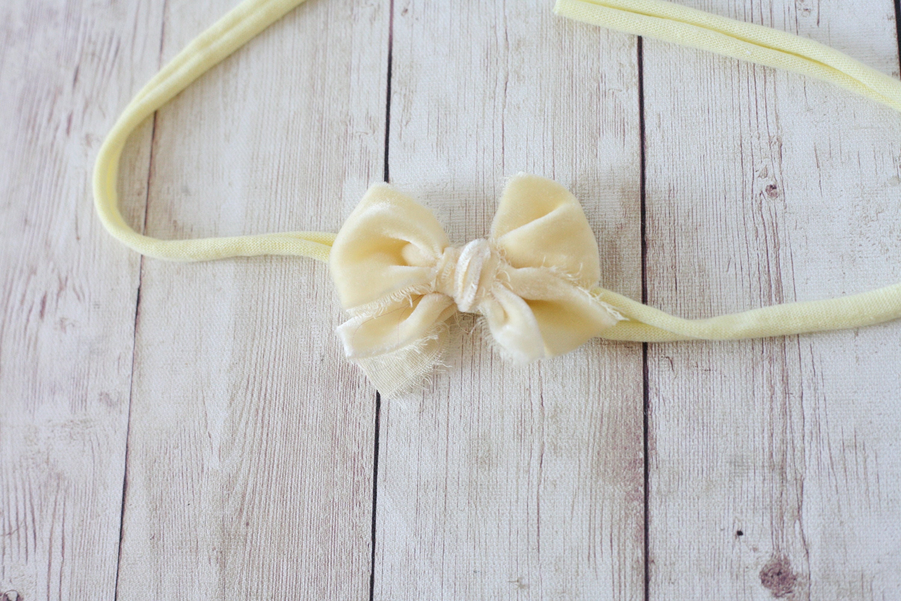 Buttercup pale pastel yellow velvet bow newborn headband | Etsy