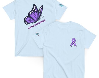 May include: Light blue t-shirts with a butterfly and ribbon design. One shirt features a large purple butterfly with the words "Lupus Awareness." The other shirt has a purple awareness ribbon on the chest.