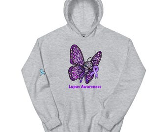 May include: A light gray hooded sweatshirt featuring a purple butterfly with a purple ribbon, and the words "Lupus Awareness". A small blue ribbon is on the left sleeve.