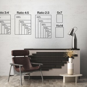 May include: A room interior with a modern design. The image features a dark brown chair, a black and white cabinet, and a small round table. On the wall are diagrams showing different aspect ratios for prints, including 5x7 and 11x14 inch sizes.
