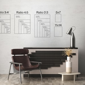 May include: A room interior with a modern design. The image features a dark brown chair, a black and white cabinet, and a small round table. On the wall are diagrams showing different aspect ratios for prints, including 5x7 and 11x14 inch sizes.
