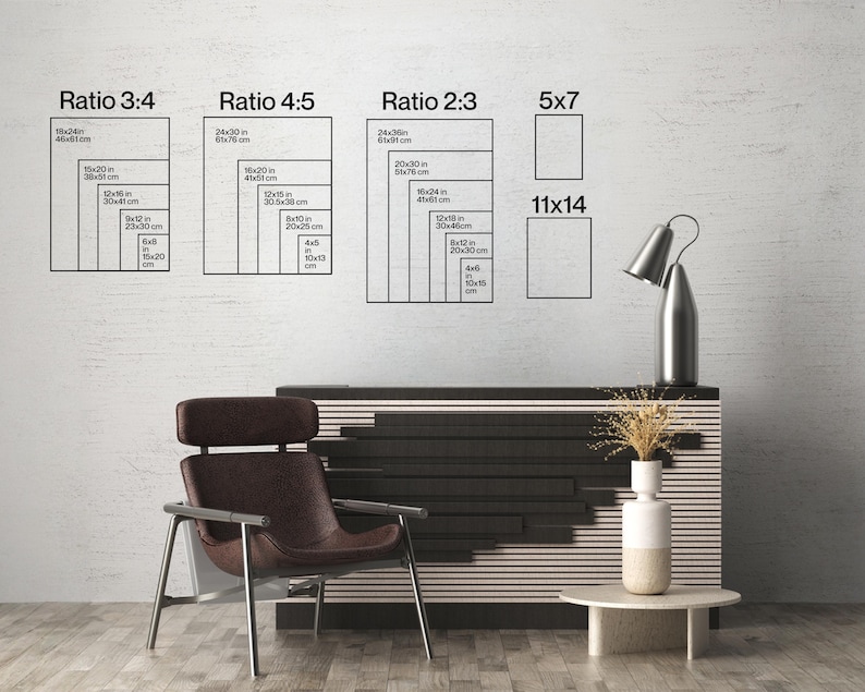 May include: A room interior with a modern design. The image features a dark brown chair, a black and white cabinet, and a small round table. On the wall are diagrams showing different aspect ratios for prints, including 5x7 and 11x14 inch sizes.