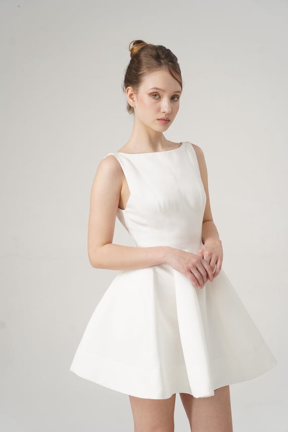 white flare graduation dress Zapakasa Women White Lace Off The Shoulder Midi Boho Graduation Dress with  Ruffles Flare Sleeves A Line Little White Dress main image 0