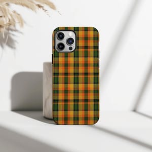 May include: A smartphone case featuring a green, orange, and yellow plaid design. The case is designed for a smartphone and has a camera aperture. The case is displayed on a white surface.