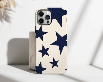 May include: A phone case with a cream-colored background and a pattern of navy blue stars of varying sizes. The case has a glossy finish and is designed to fit a smartphone, with cutouts for the camera and buttons.