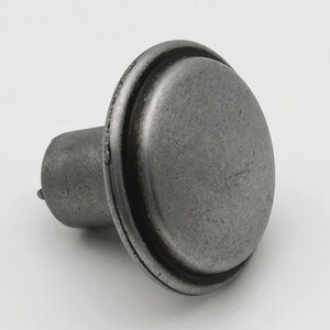 Knopphandtag, tennutseende, artikel 11.6430.59