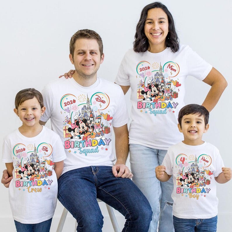 May include: White t-shirts with colorful Disney-themed graphics. The shirts feature Mickey and Minnie Mouse, Donald Duck, and other characters, with the text "Birthday Squad", "Birthday Crew", and "Birthday Boy".