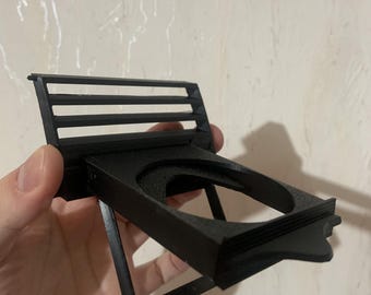 Portavasos incorporado en la ventilación central del Skoda Fabia MK1