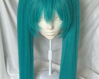 Miku Lasergesneden Cosplay Pruik, Volledige Corn Perm Pruik, Ingebouwd Natuurlijk Hoog Hoofdeffect, Lange Twee Staartjes