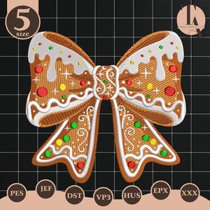 May include: A detailed embroidery design of a gingerbread bow, featuring brown, white, red, green, and yellow accents. The bow has a textured appearance with decorative icing and colorful sprinkles. The design is set against a black grid background.
