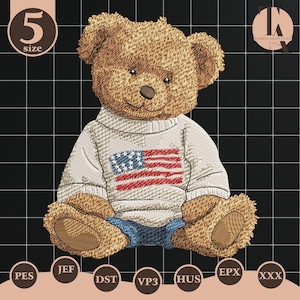 May include: Embroidered teddy bear wearing a white sweater with an American flag design and blue denim shorts. The bear has brown fur and is sitting. The image includes the text "5 size" and various embroidery file format labels.
