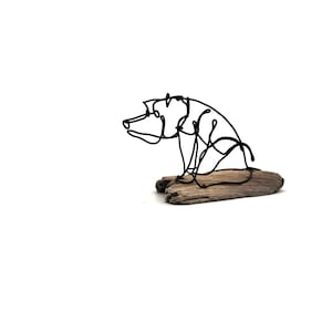 Sitting Bear Cub Wire Sculpture on Driftwood: One Line Sculpture