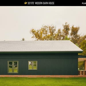 May include: An architectural rendering of a modern barn house. The building features a dark green exterior, a light gray roof, and two windows with green frames. The text "30'X70' MODERN BARN HOUSE" is visible at the top.