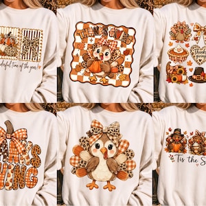 May include: A collection of six cream-colored crewneck sweatshirts, each featuring a unique Thanksgiving-themed graphic print. Designs include turkeys, pumpkins, plaid patterns, leopard print accents, and text such as 'Thanksgiving' and 'Tis the Season'.