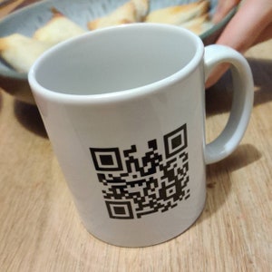 Mystery QR Code Mug. Silly Humour. Juvenile. Puerile. Childish. Rickroll. Meme. Troll. Internet. Rick Astley. Never Gonna Give You Up.