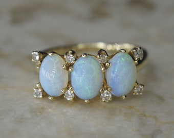 Vintage 14k gouden ring met opaal en diamant, ca. 1960