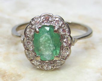 Vintage H. Stern 18k Emerald and Diamond Halo Ring